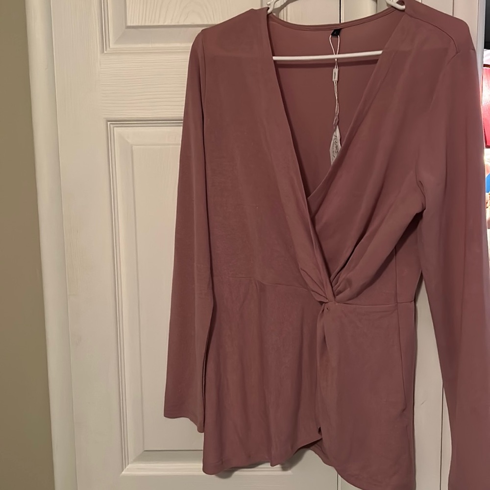 Woman’s top dusty rose with slight shimmer.